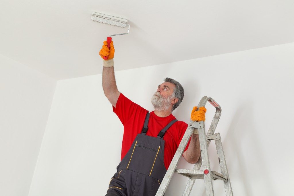 painting the ceiling with white paint