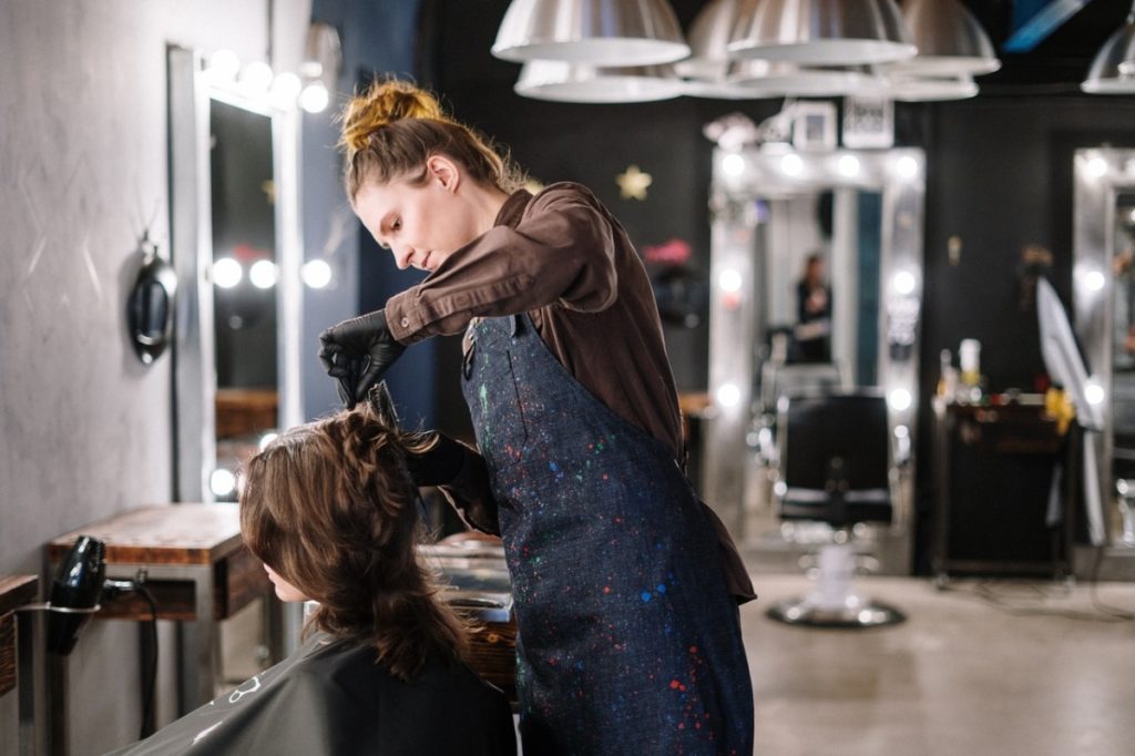 woman cutting hair